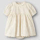 Lil' Atelier babyklänning kokosmjölk NBFFLORES