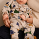 Liewood Pyjamasoverall Birk Grow Dino roar / Sandy